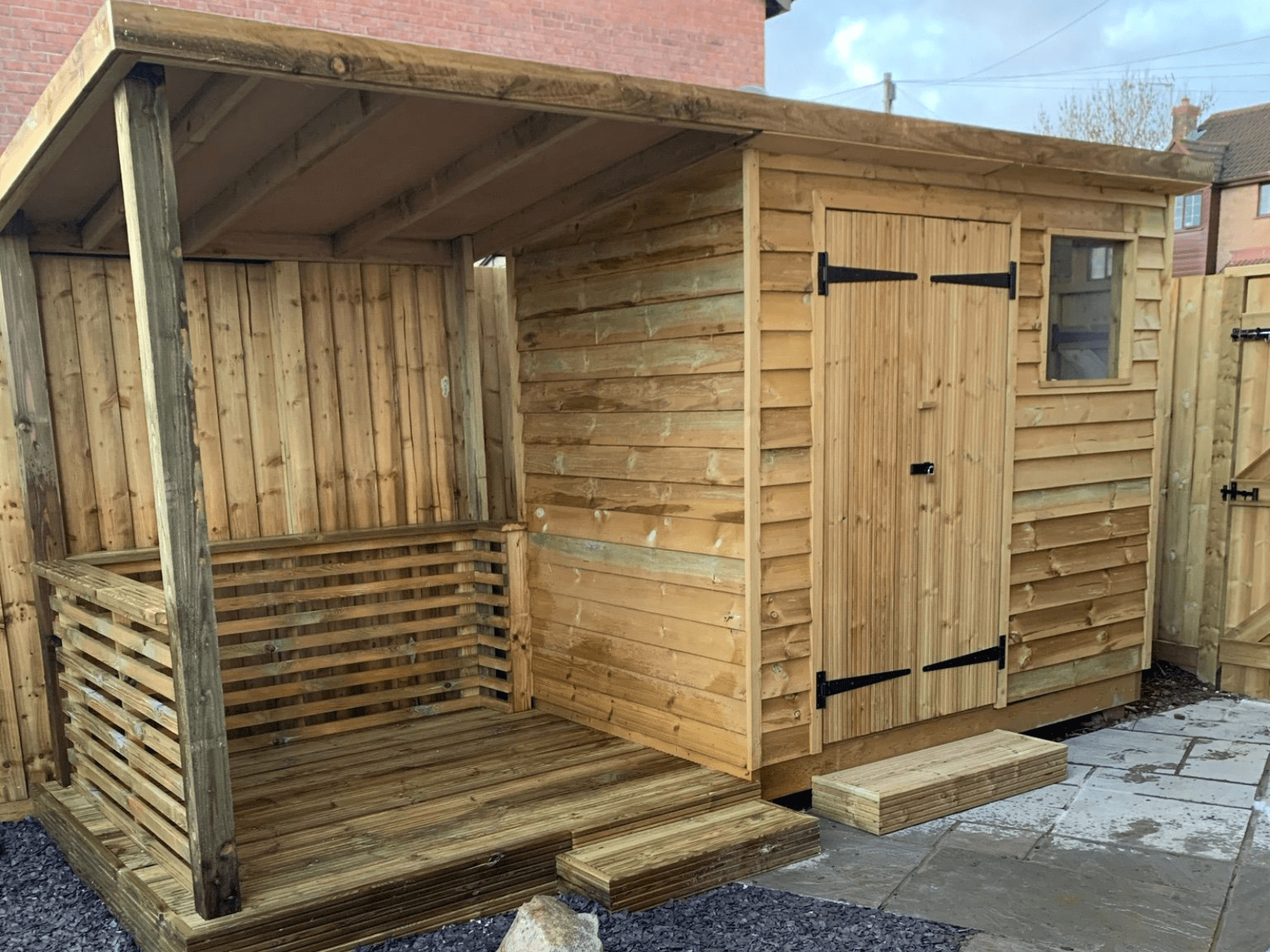 Custom made garden shed with shelter area